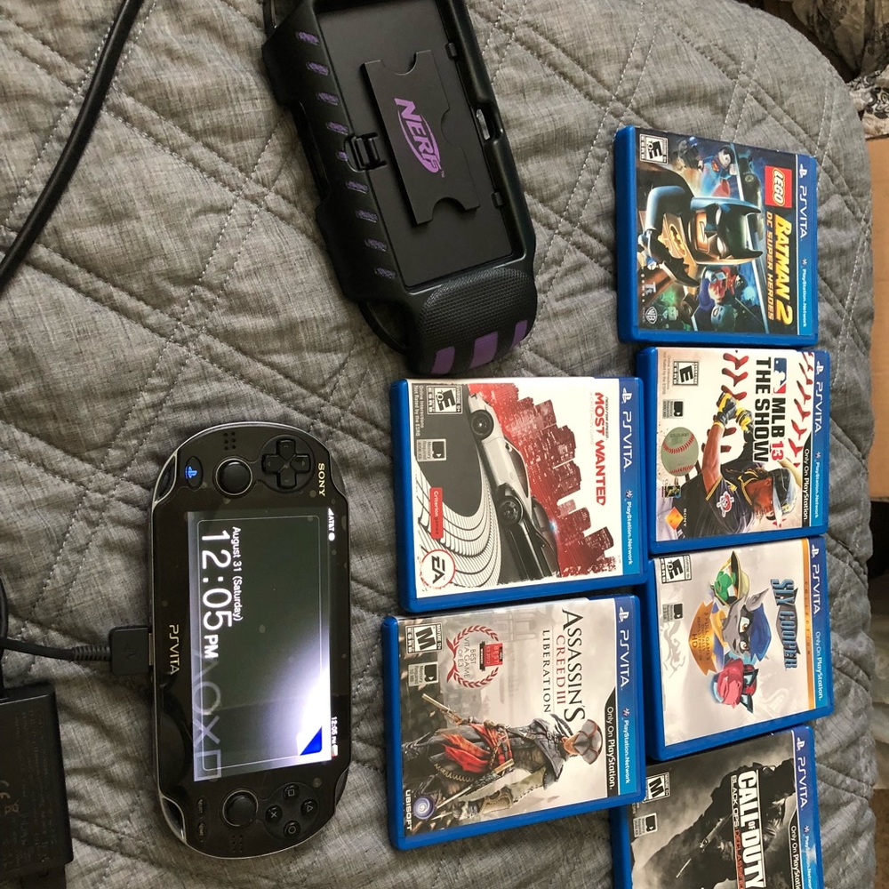 Ps Vita with Games and Accessories